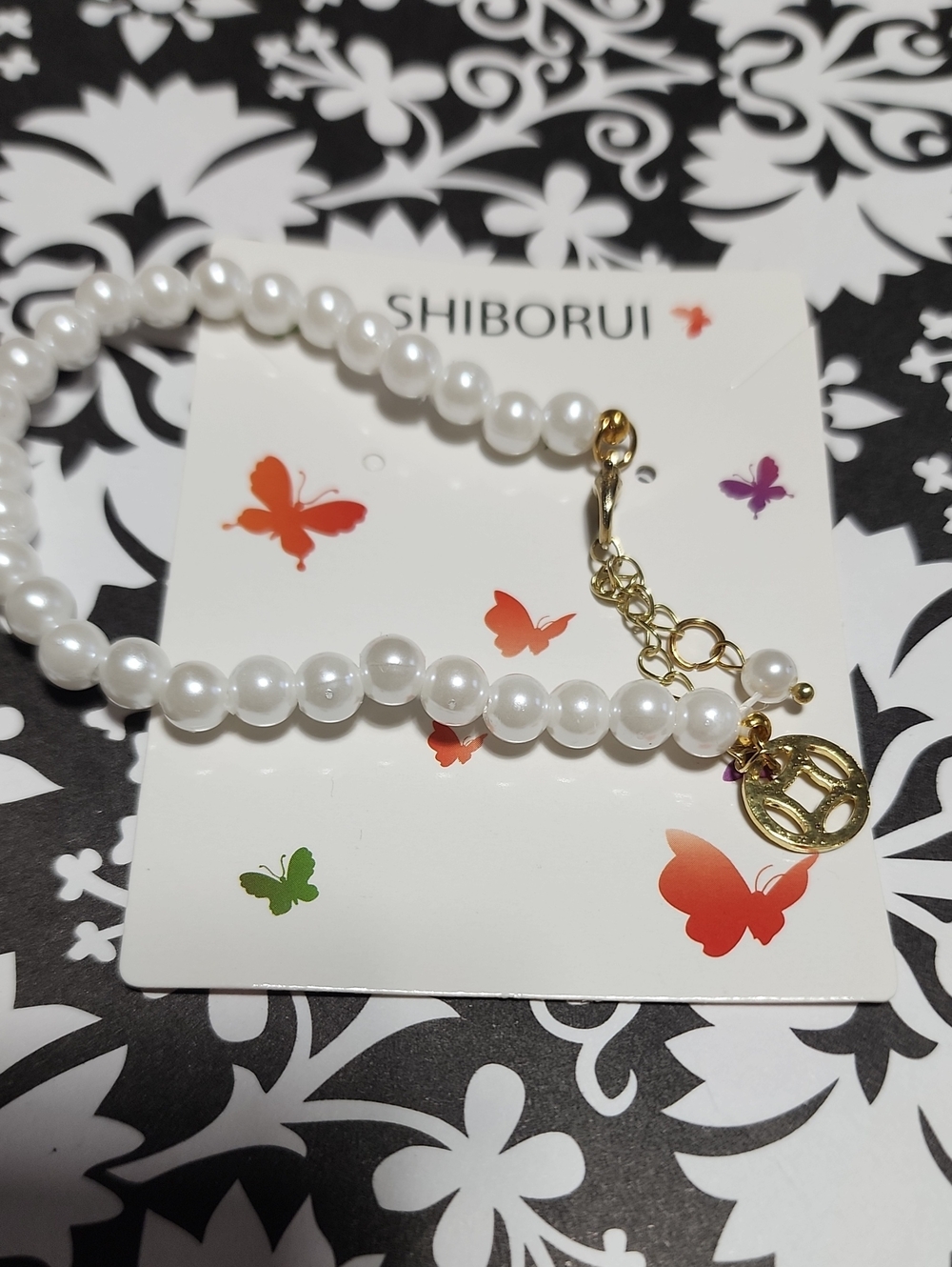 White Pearl Bracelet with Gold Charm